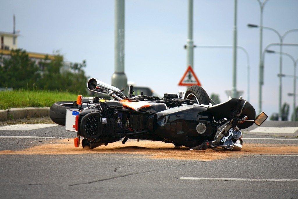 Motorcycle down on the road
