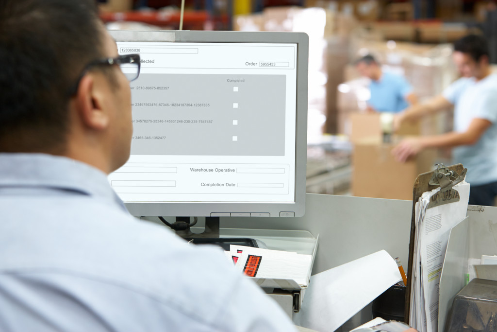 man using a system for delivery tracking