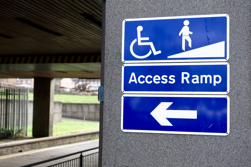 Signage in a public space for disabled